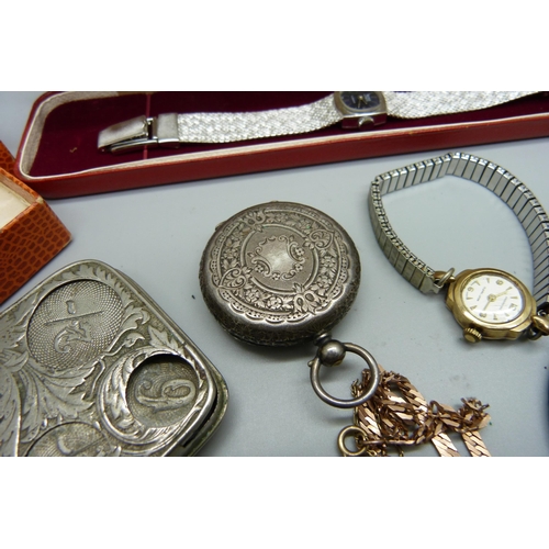 853 - A lady's 9ct gold wristwatch, a 9ct gold bracelet, 4.7g, a silver and gold stone ring, a silver fob ... 