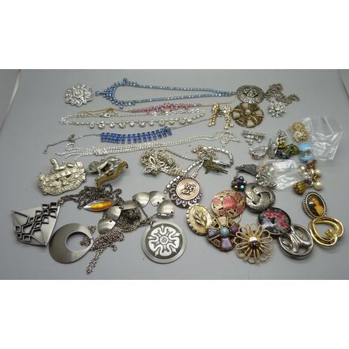 858 - Assorted jewellery including paste, 1970's stainless steel, military badges, etc.