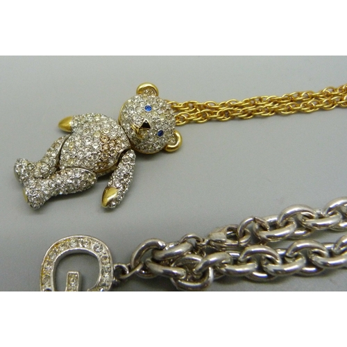 861 - A Brookes and Bentley Teddy bear necklace, two Swarovski pendants, a Swatch pendant and a Guess brac... 