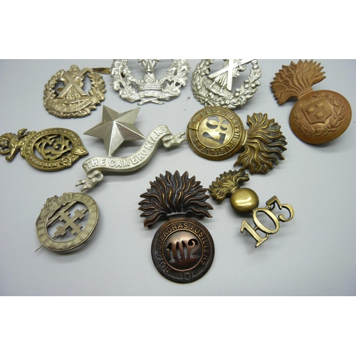 863 - A collection of cap badges, mainly Scottish and Irish regiments