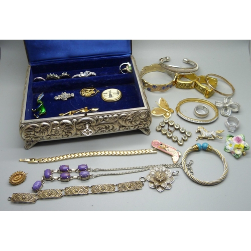 879 - A jewellery box marked Alpaca Versilbert with bracelets including Swarovski and Fish, dress rings, e... 