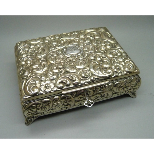 879 - A jewellery box marked Alpaca Versilbert with bracelets including Swarovski and Fish, dress rings, e... 