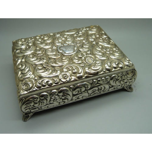 879 - A jewellery box marked Alpaca Versilbert with bracelets including Swarovski and Fish, dress rings, e... 