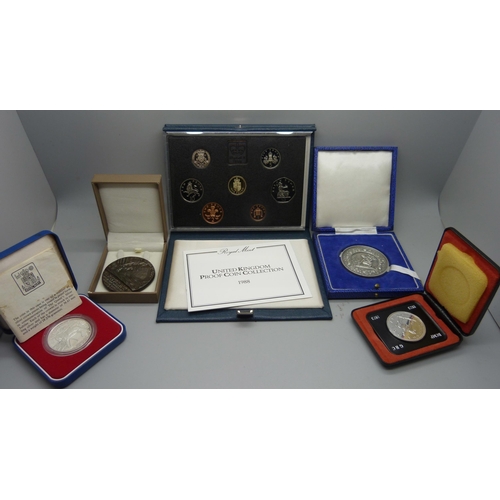 881 - A silver proof crown, a 1988 Royal Mint decimal coin set, a Lucitania medallion, etc.