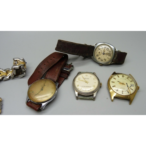 891 - A Buren military wristwatch and other watch heads, etc., two lacking case backs