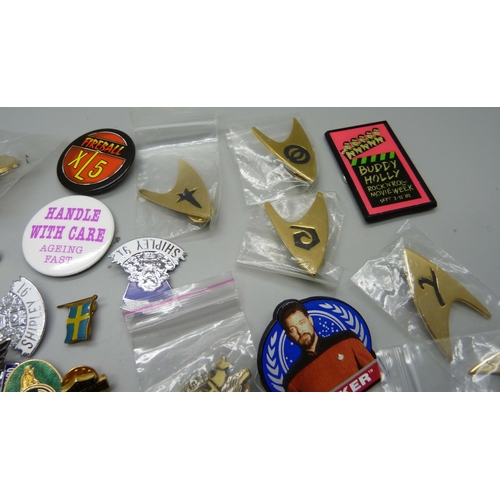 892 - A collection of Harley-Davidson and Triumph badges and Star Trek badges