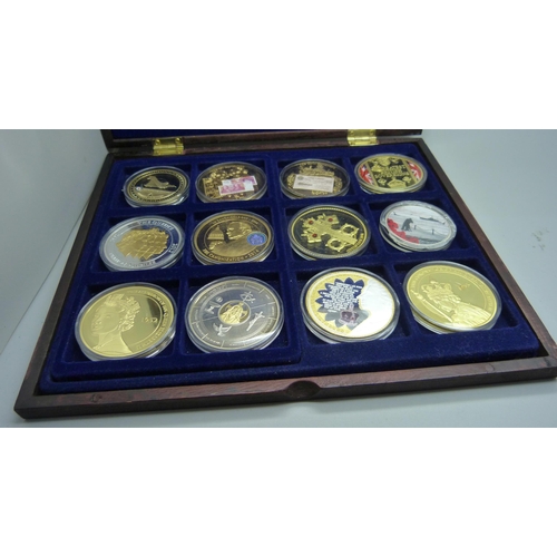 898 - Four boxed sets of gold plated coins including Royalty related, planes, history, commemorative, etc.