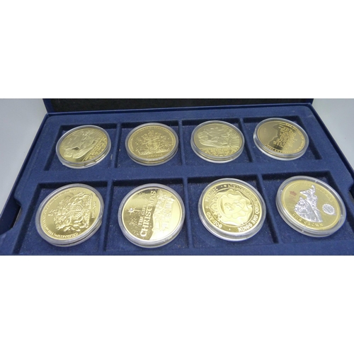 898 - Four boxed sets of gold plated coins including Royalty related, planes, history, commemorative, etc.