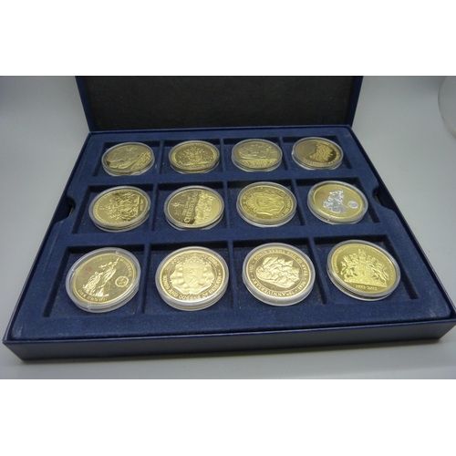 898 - Four boxed sets of gold plated coins including Royalty related, planes, history, commemorative, etc.