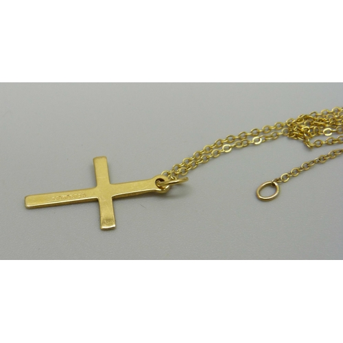 915 - A 9ct gold cross and chain, 1.4g