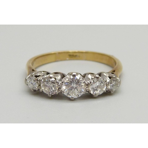 921 - An 18ct gold, five stone diamond ring, 2.5g, L