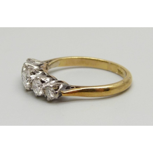 921 - An 18ct gold, five stone diamond ring, 2.5g, L