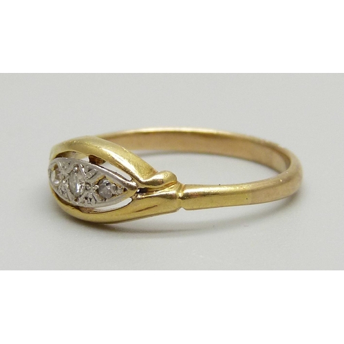 925 - An Edwardian three stone diamond ring, 2g, M, (tests as 18ct gold)