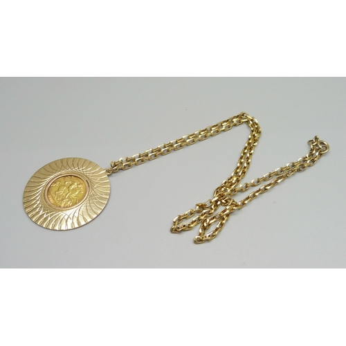 927 - A 1912 half sovereign in a 9ct gold mount and on a 9ct gold chain, total weight 21.4g