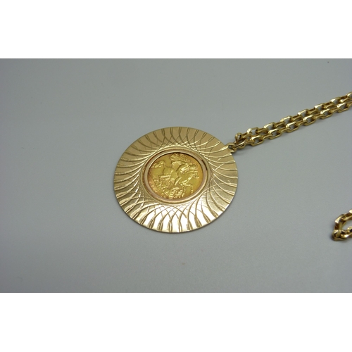 927 - A 1912 half sovereign in a 9ct gold mount and on a 9ct gold chain, total weight 21.4g