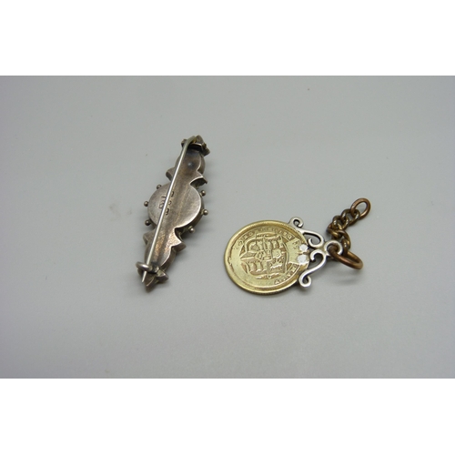 928 - A Victorian silver brooch and silver gilt coin pendant