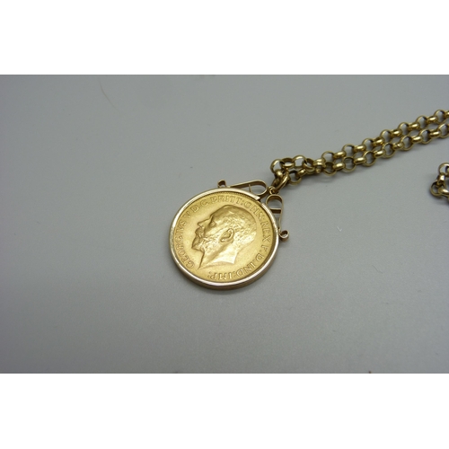 944 - A 1927 full sovereign in a 9ct gold mount and on a 9ct gold chain, 17.7g