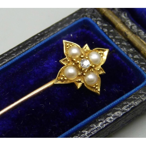 952 - An 18ct gold stick pin set with pearls and diamonds, 1.2g