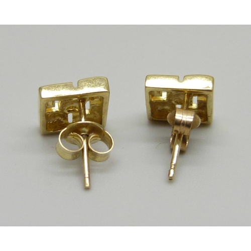 953 - A pair of 9ct gold earrings, 1.6g