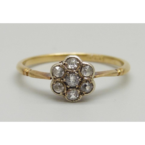 955 - An 18ct gold and cluster ring, 1.5g, N