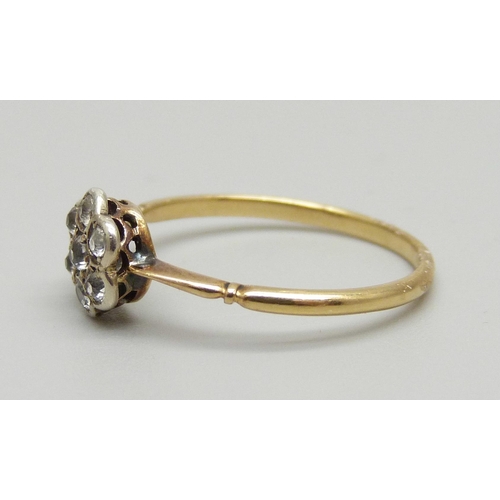 955 - An 18ct gold and cluster ring, 1.5g, N