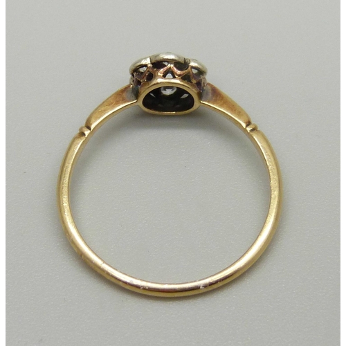 955 - An 18ct gold and cluster ring, 1.5g, N