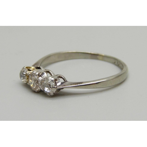 967 - A platinum and diamond three stone ring, 1.8g, M