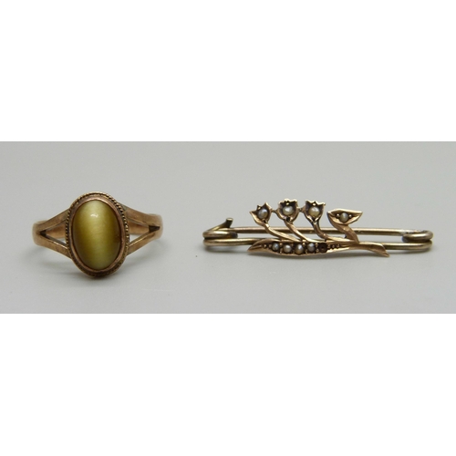 974 - A 9ct gold ring, 1.8g, L, and a 9ct gold brooch, 1.4g, lacking one pearl