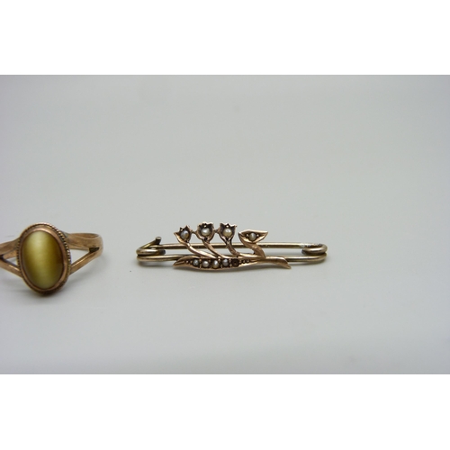 974 - A 9ct gold ring, 1.8g, L, and a 9ct gold brooch, 1.4g, lacking one pearl