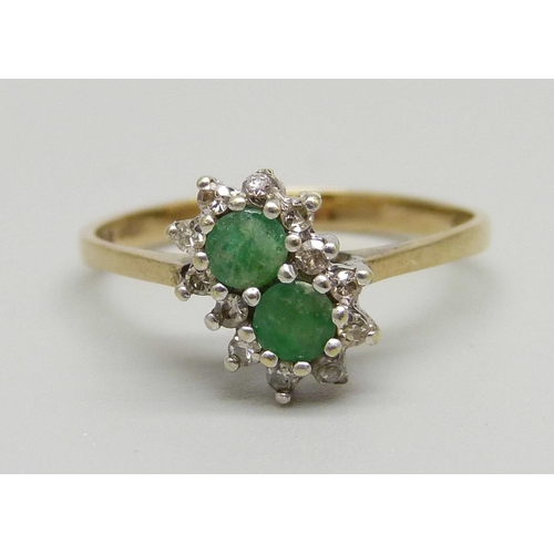 975 - A 9ct gold, emerald and diamond double cluster ring, 1.7g, N