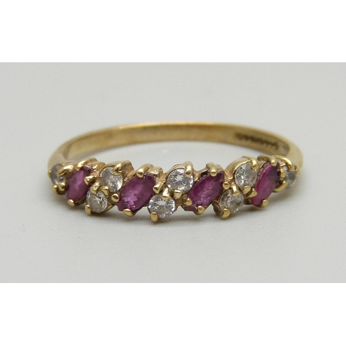 976 - A 9ct gold, ruby and zircon ring, 1.6g, P