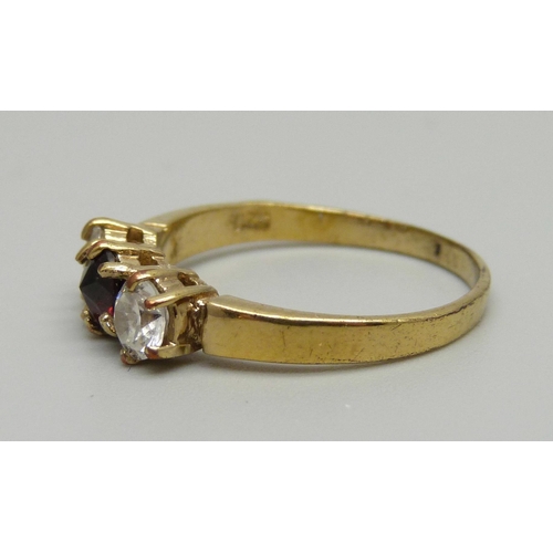 978 - A silver gilt, garnet and zircon ring, R