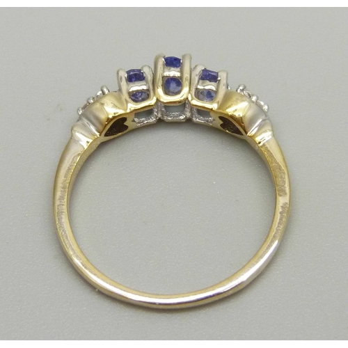 986 - A silver gilt, blue stone and zircon ring, P