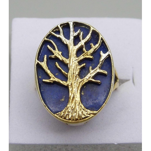 988 - A silver gilt, lapis lazuli tree of life ring, J