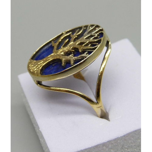 988 - A silver gilt, lapis lazuli tree of life ring, J