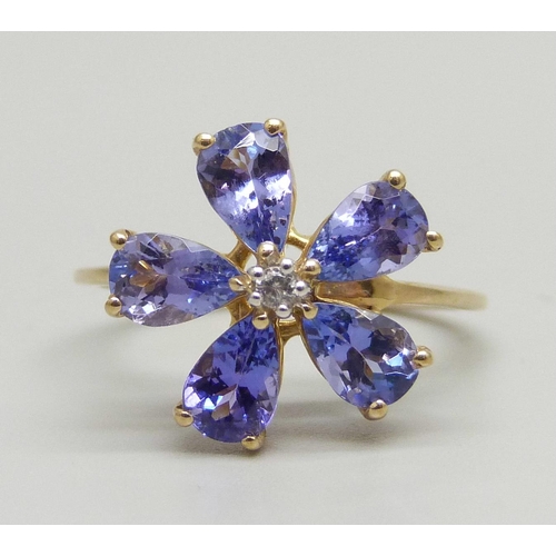 990 - A 9ct gold and tanzanite cluster ring, 2.3g, N