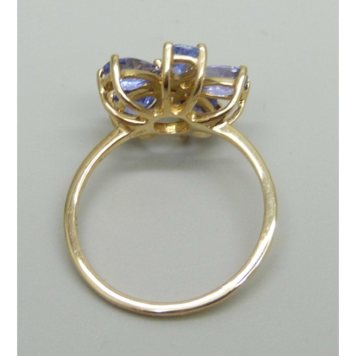 990 - A 9ct gold and tanzanite cluster ring, 2.3g, N