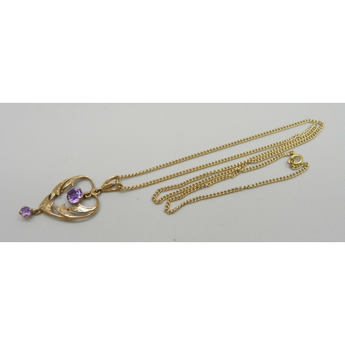 997 - A 9ct gold Art Nouveau style amethyst pendant on a chain, pendant 2.4g