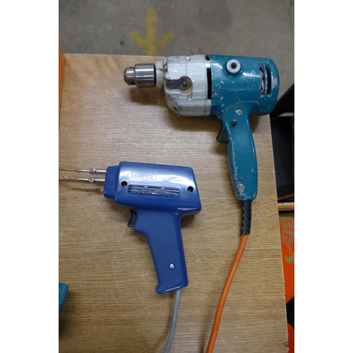 2012 - A Black & Decker drill, a circular saw with instructions and attachment, a jigsaw attachment, a chis... 