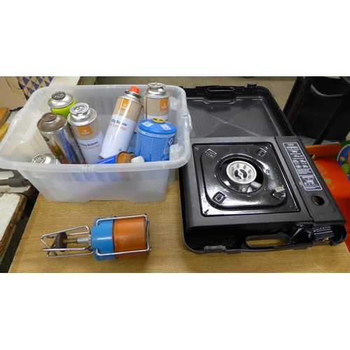 2016 - A Sparkright portable cooker - W with 4 gas canisters and various gas cartridges and cooker