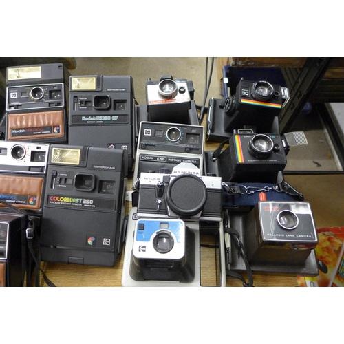 2060 - 2 Boxes of 35mm and instant cameras including Poloroid, Kodak, Nikon and more