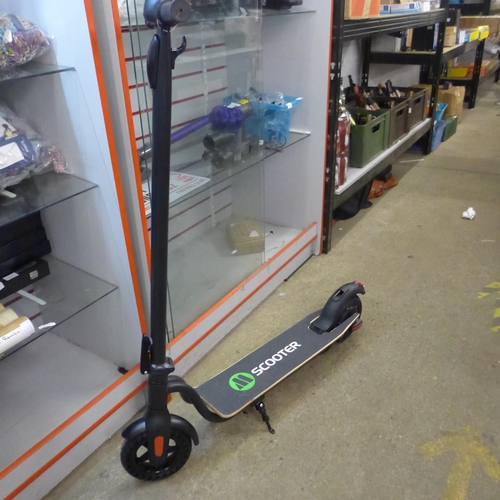 2095 - An electric scooter unused with box and charger