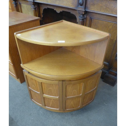 101 - A small Nathan teak corner cabinet