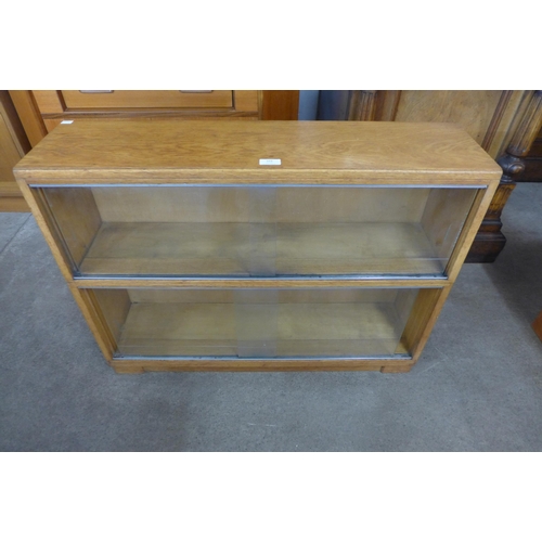 103 - A Minty light oak two tier bookcase