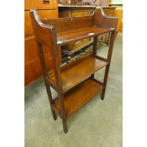 117 - A small Arts and Crafts oak open bookcase