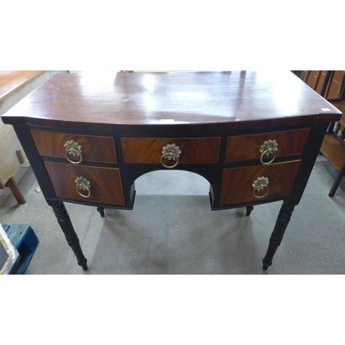 127 - A small Regency painted mahogany bow front sideboard