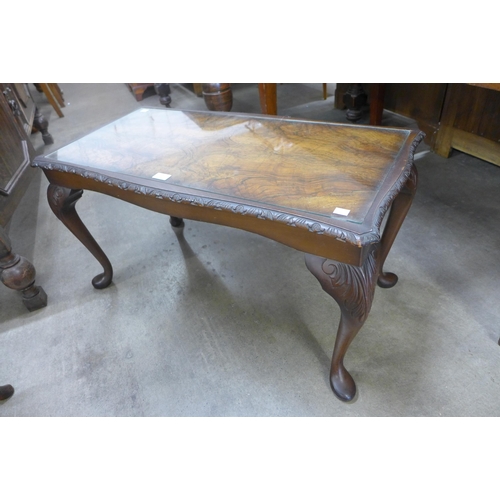 132 - A burr walnut coffee table