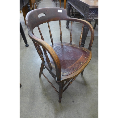 138 - A Victorian oak Captains desk chair