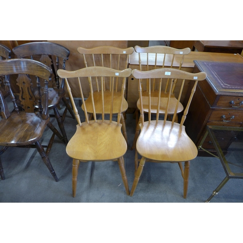 152 - A set of four beech kitchen chairs