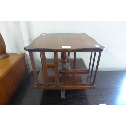 154 - A small early 20th Century walnut desktop revolving bookcase